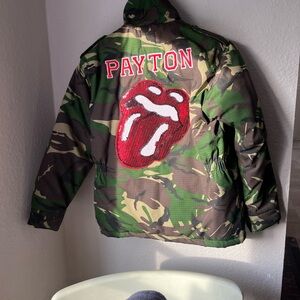 Cat In The Hood. Kids Camouflage jacket with Red tongue Sequin Design.